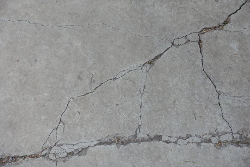 What Causes Concrete Cracks, Spalling, And Surface Damage